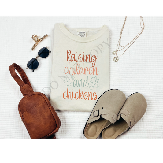 Raising children and chickens Tee